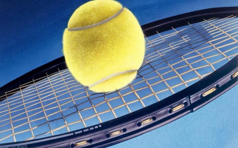 tennis ball on racket