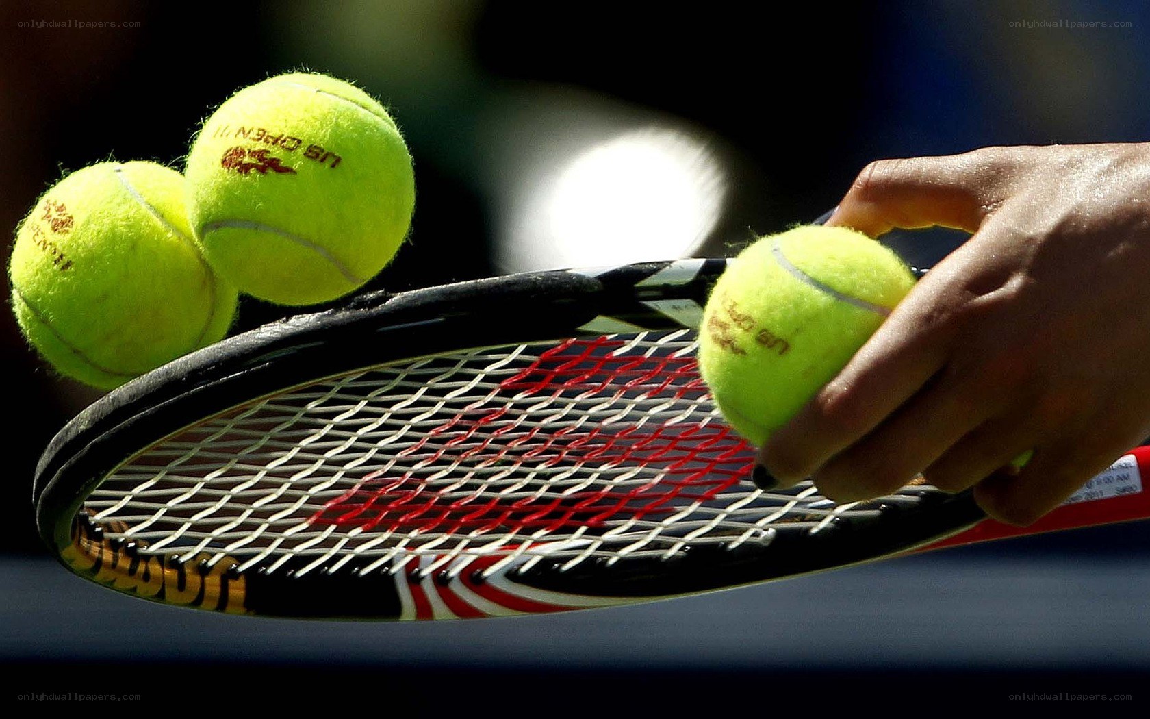 tennis balls and racket
