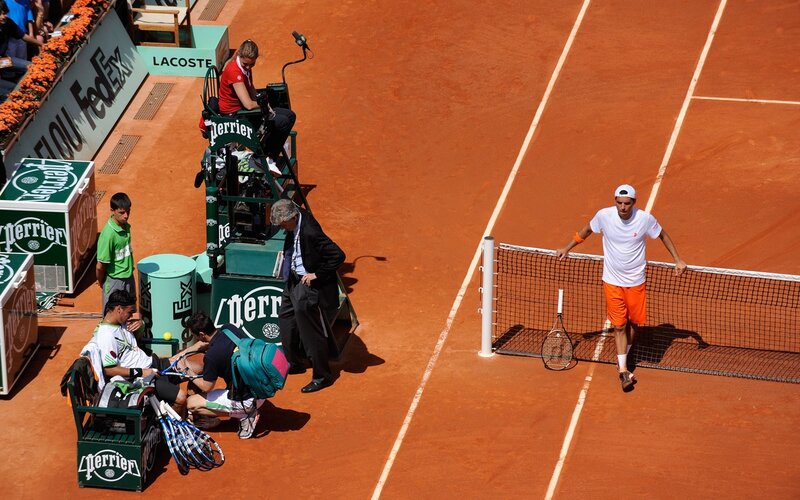 Tennis match on clay court