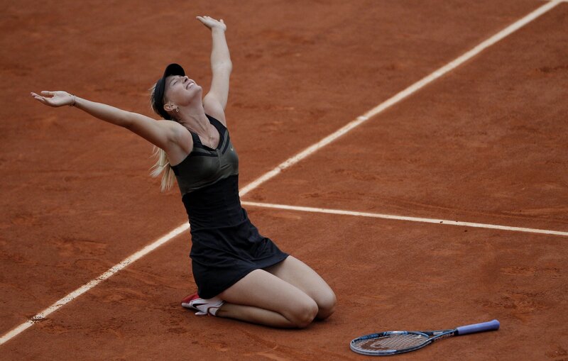 Tennis player celebrates victory