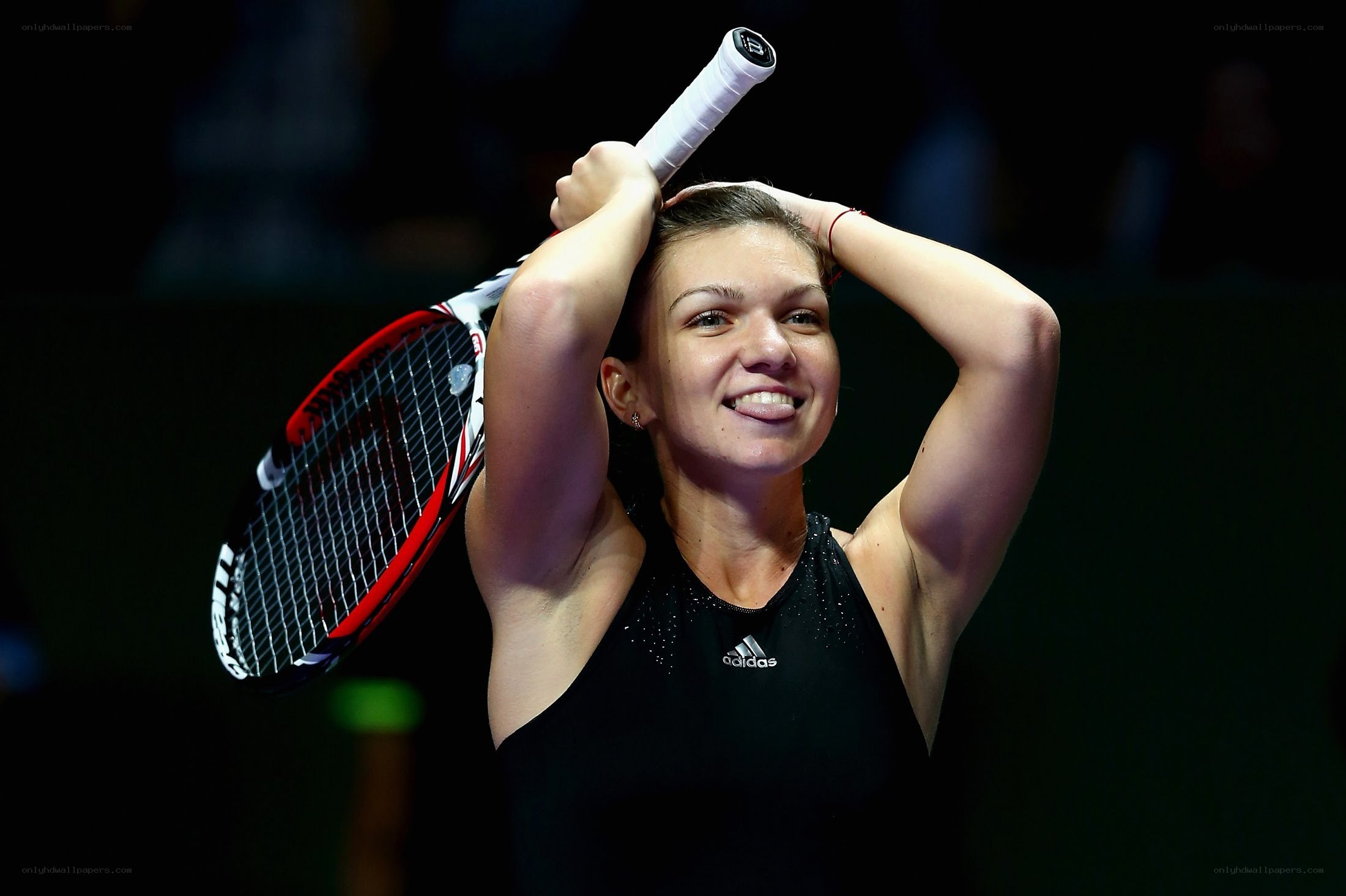 tennis player celebrating victory