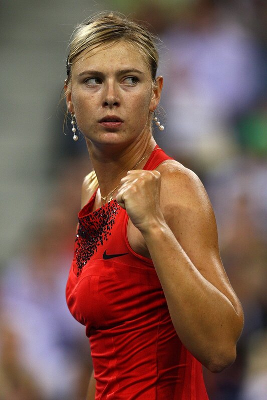 tennis player celebrating victory