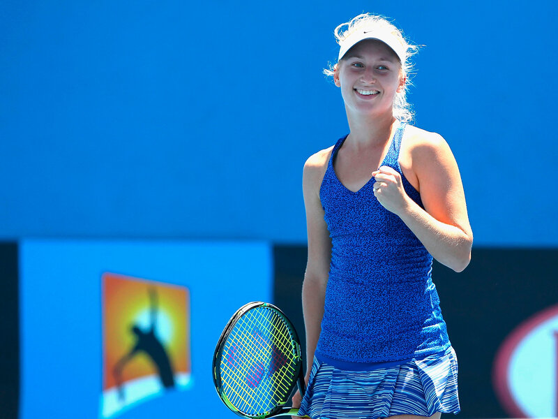 tennis player celebrating win