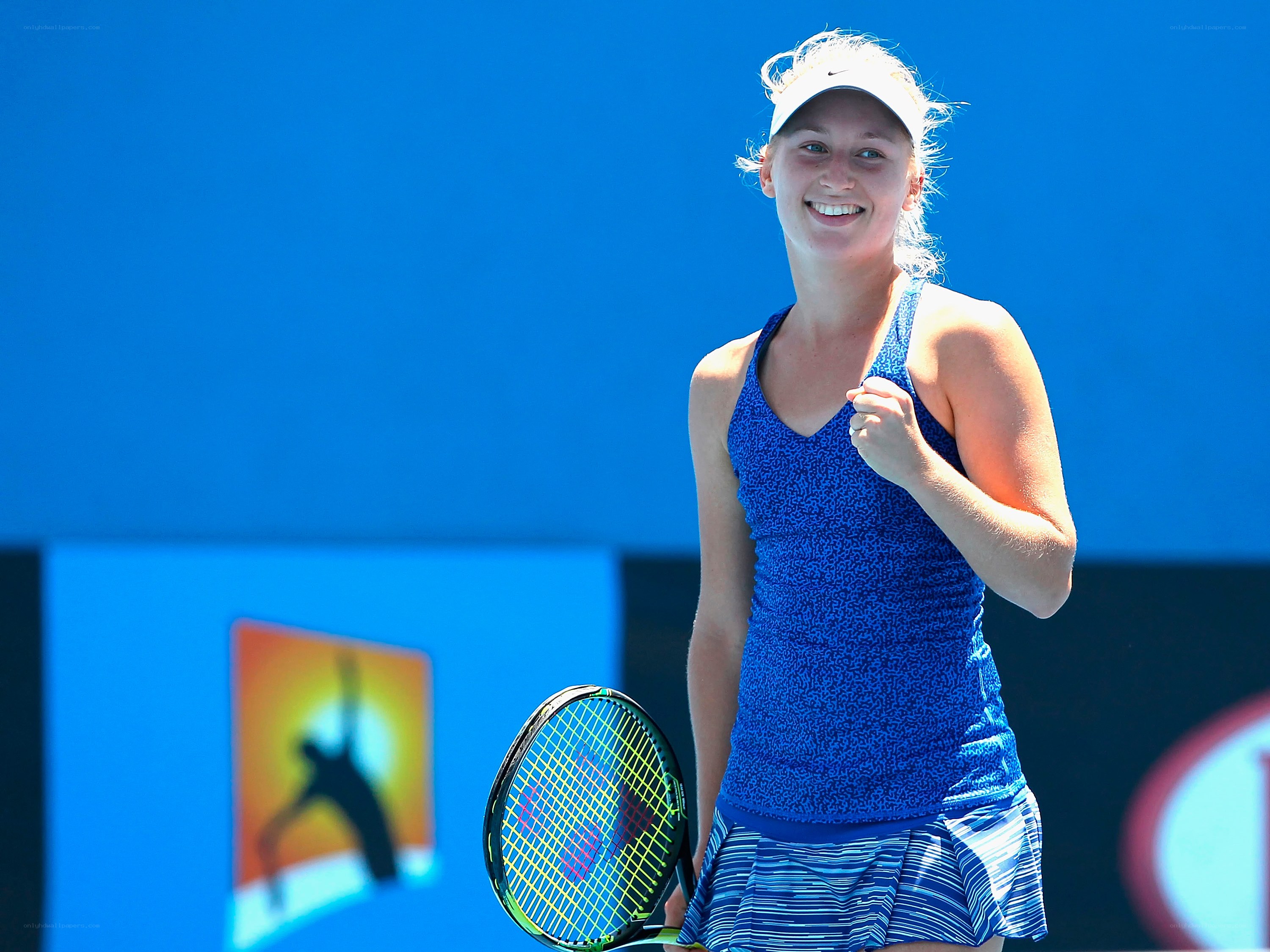 tennis player celebrating win