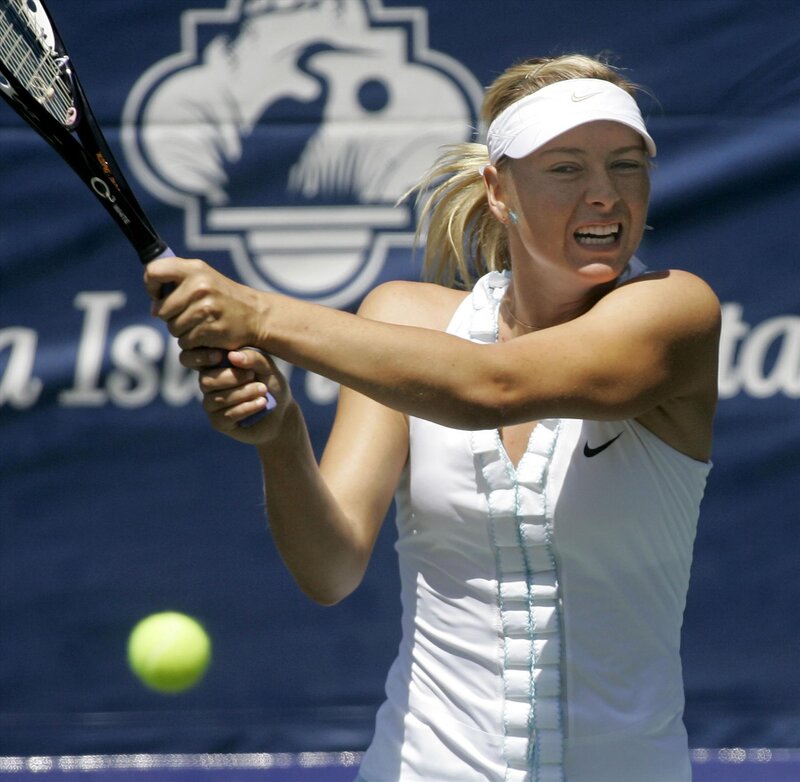 tennis player hitting a ball