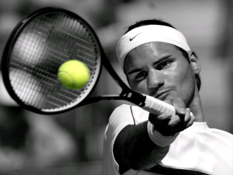 Tennis Player Hitting Ball — Black, Focused
