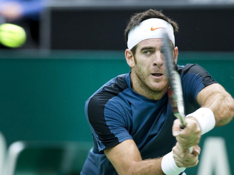 Tennis Player Hitting Ball — Blue, Focused, Photograph, Tennis Racket, Tennis Ball