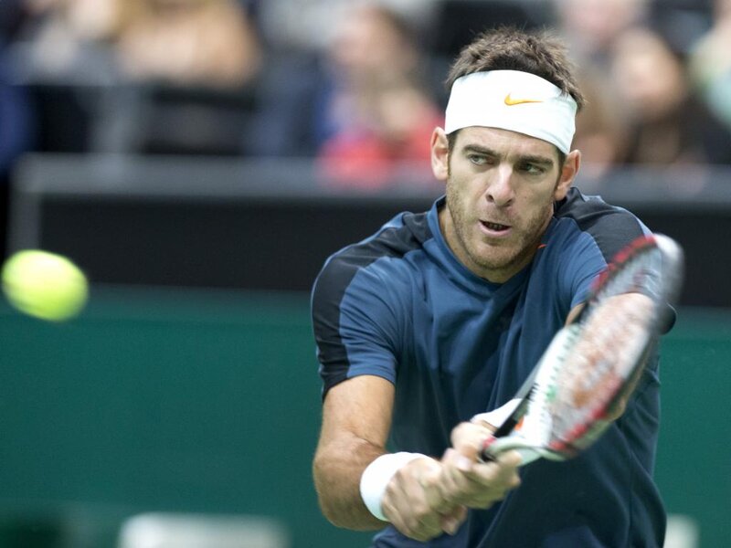 Tennis Player Hitting Ball — Blue, Focused