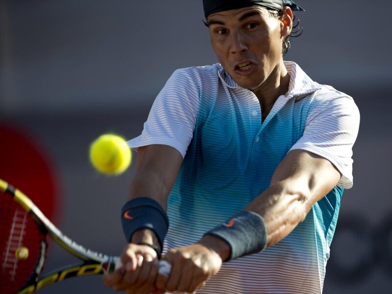 Tennis Player Hitting Ball — Blue, Intense, Afternoon, Photograph, Tennis Racket