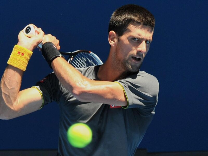Tennis Player Hitting Ball — Blue, Intense, Afternoon