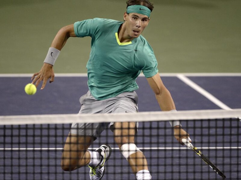 Tennis Player Hitting Ball — Green
