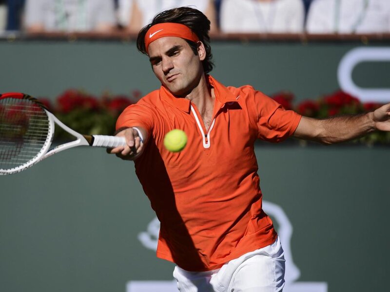 Tennis Player Hitting Ball — Orange