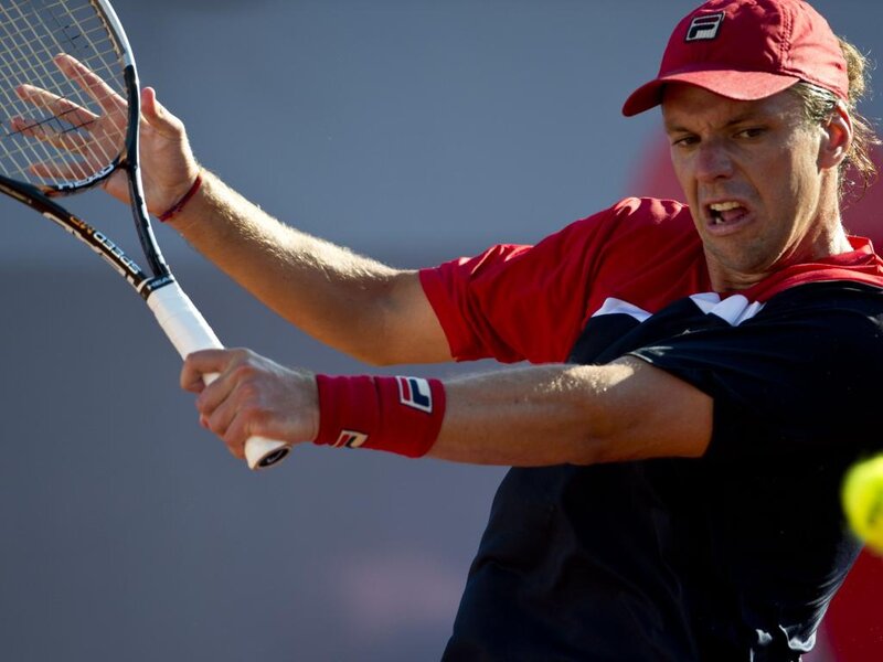 Tennis Player Hitting Ball — Red, Intense