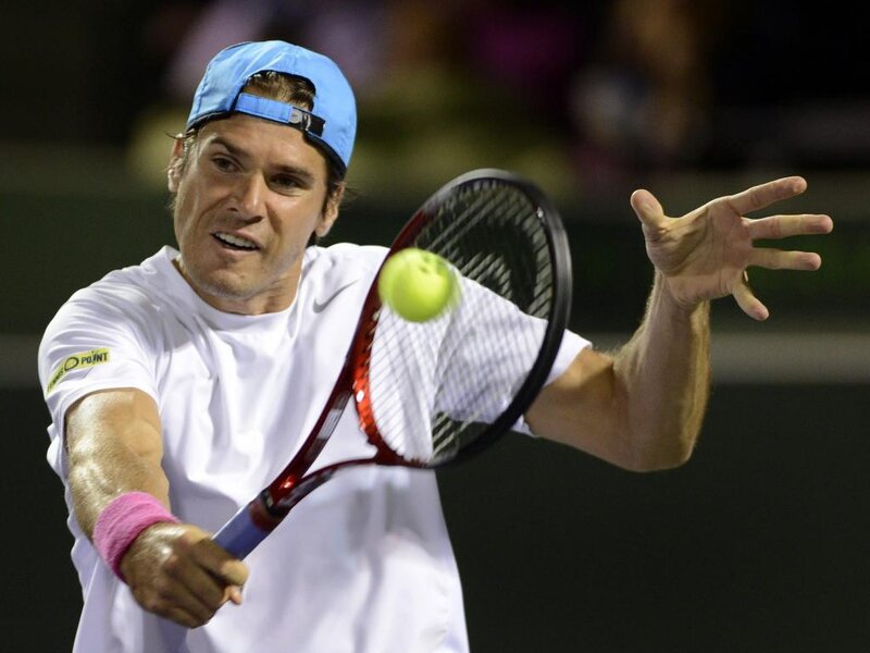 Tennis Player Hitting Ball — White, Intense, Night, Photograph