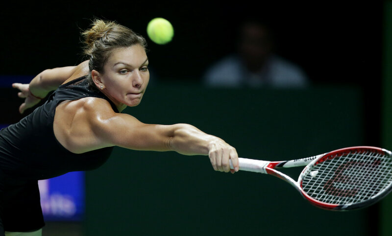 tennis player hitting forehand