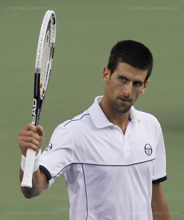 tennis player holding racket