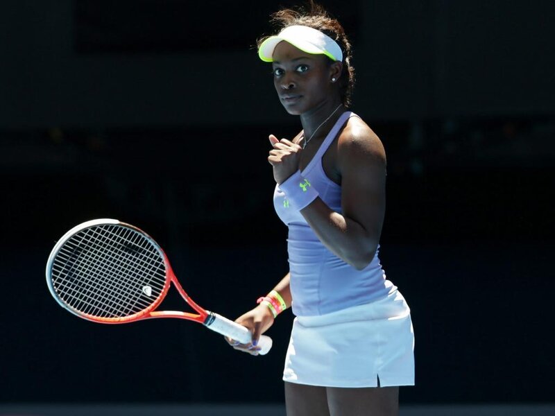 Tennis Player Holding Racket — White, Focused