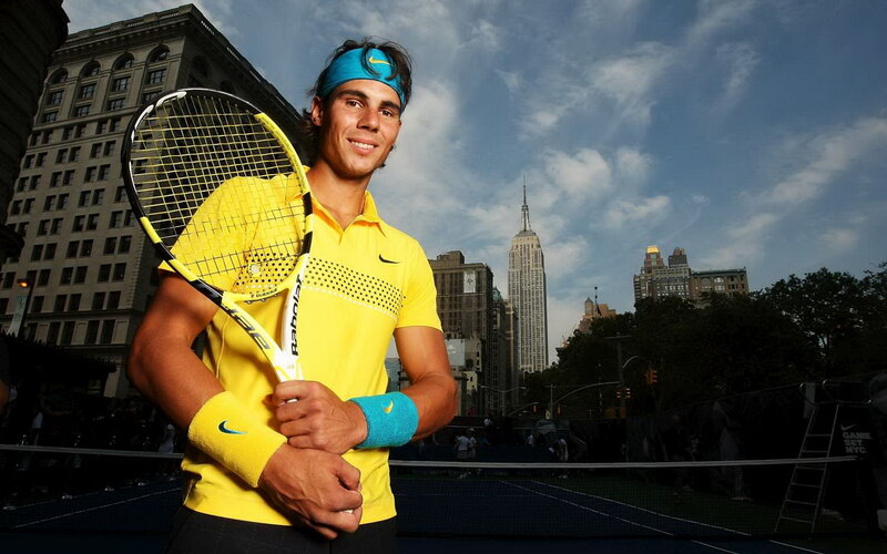Tennis Player Holding Racket — Yellow