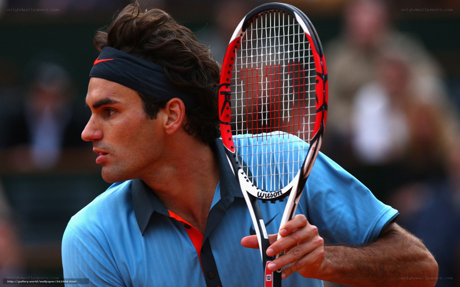 tennis player holding racket