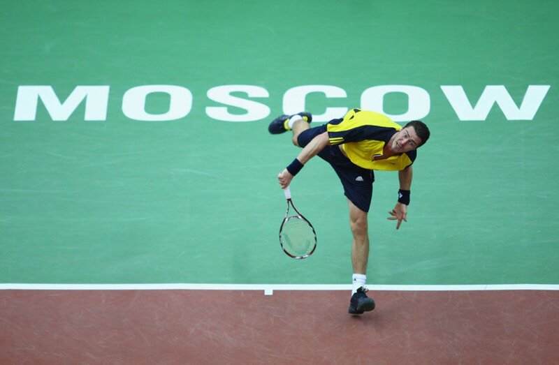 Tennis Player in Action — Green