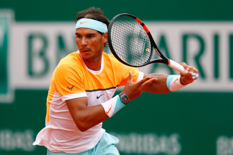 Tennis Player in Action — Orange