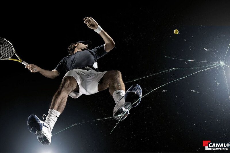 Tennis Player in Mid-air