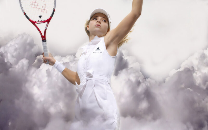 Tennis player in white dress