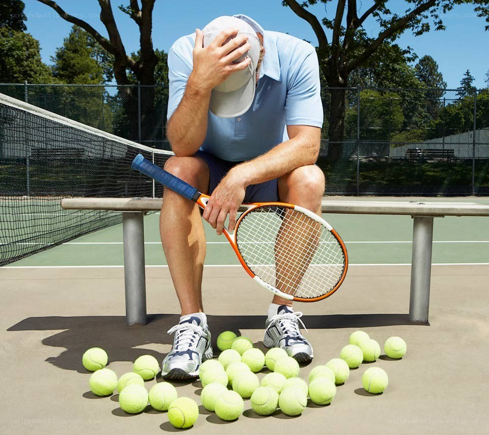 Tennis player on bench