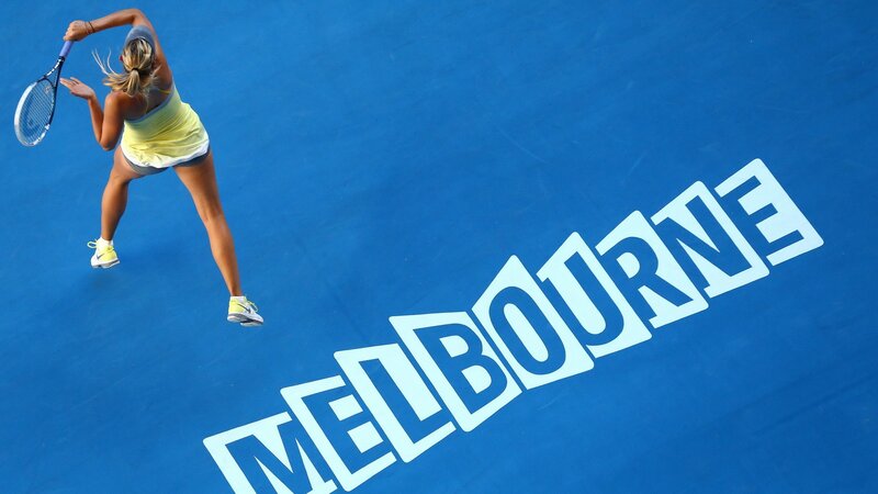 Tennis player on blue court