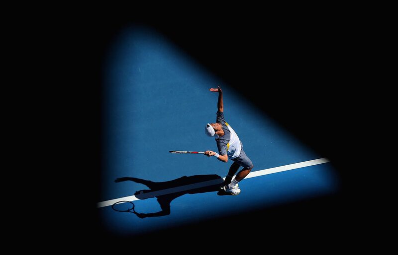 Tennis Player Serving — Blue, Dramatic