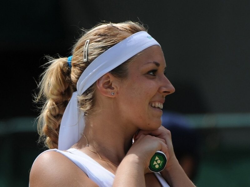 tennis player smiling