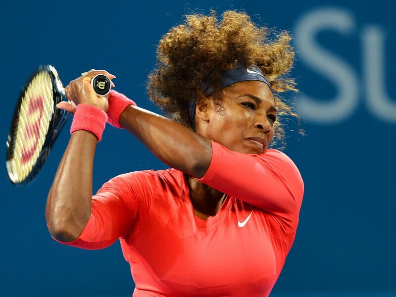 Tennis Player Swinging Racket