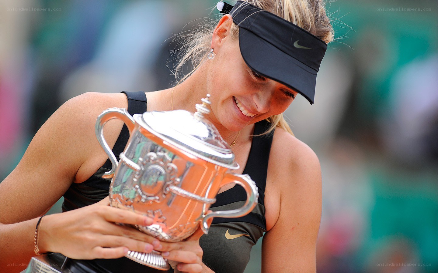 Tennis player with trophy