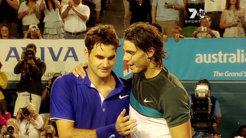 Tennis players embrace after match