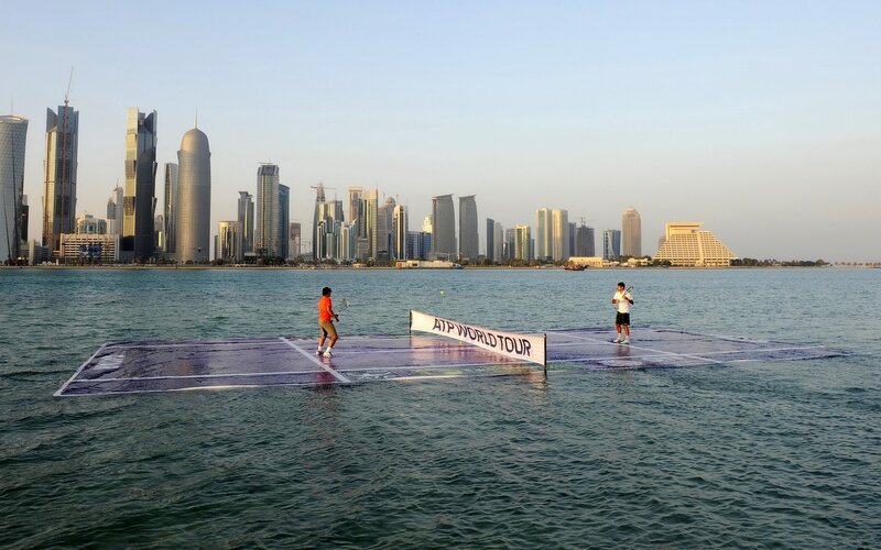 Tennis Players on Water Court — Blue