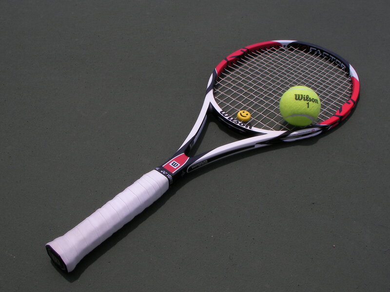 tennis racket with ball