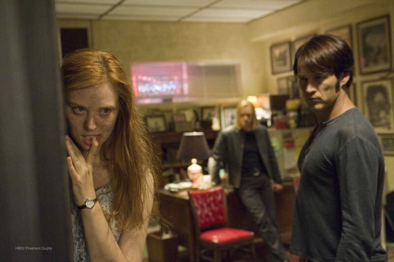 tense scene in a dimly lit room