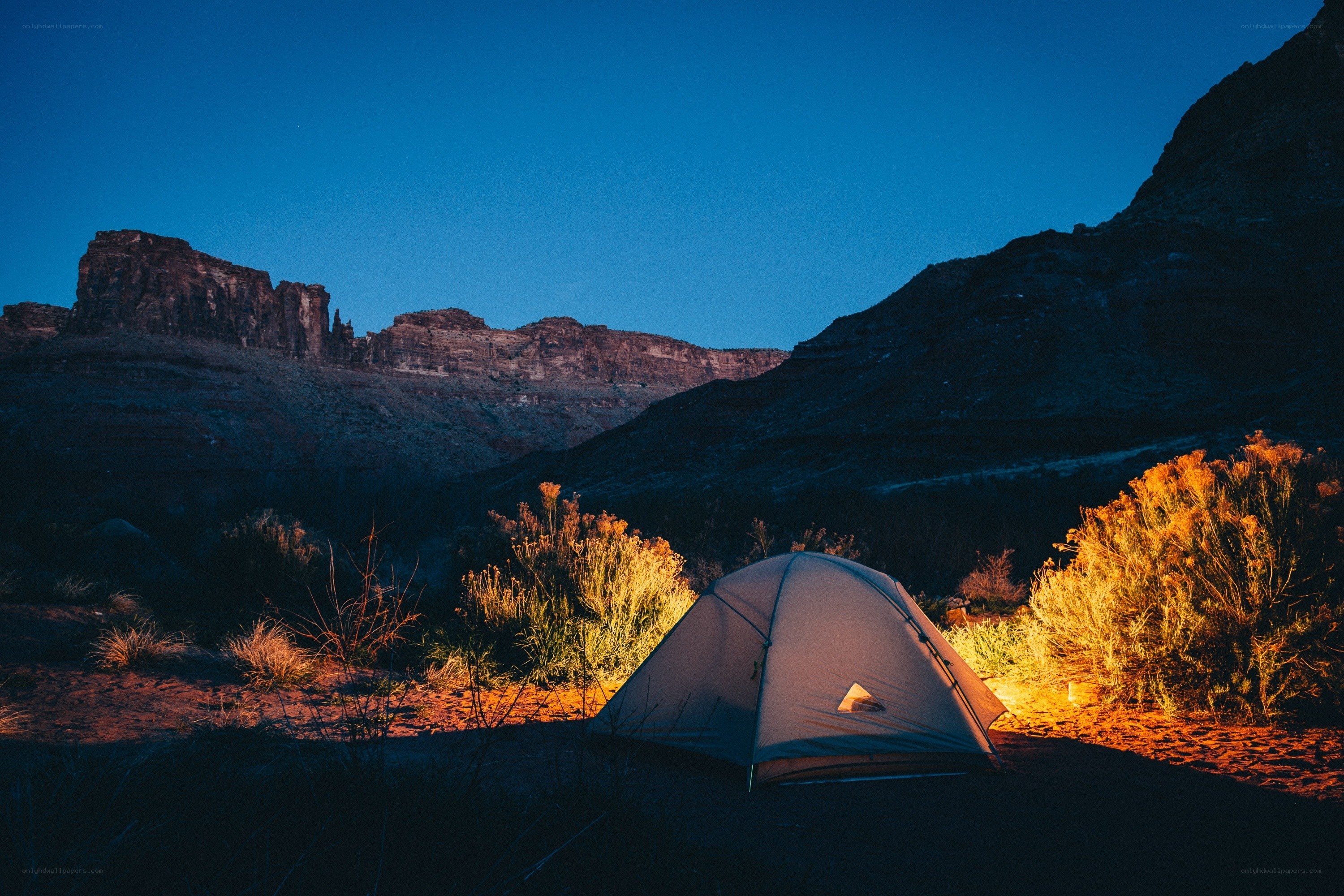 Tent at dusk in canyon