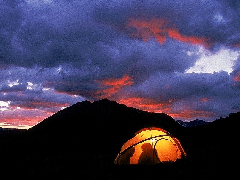 Tent at sunset in the mountains