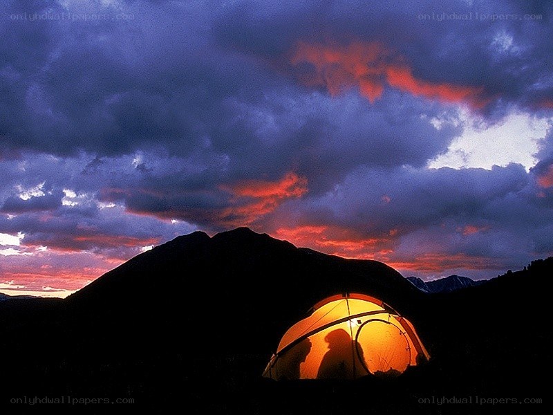 Tent at sunset in the mountains