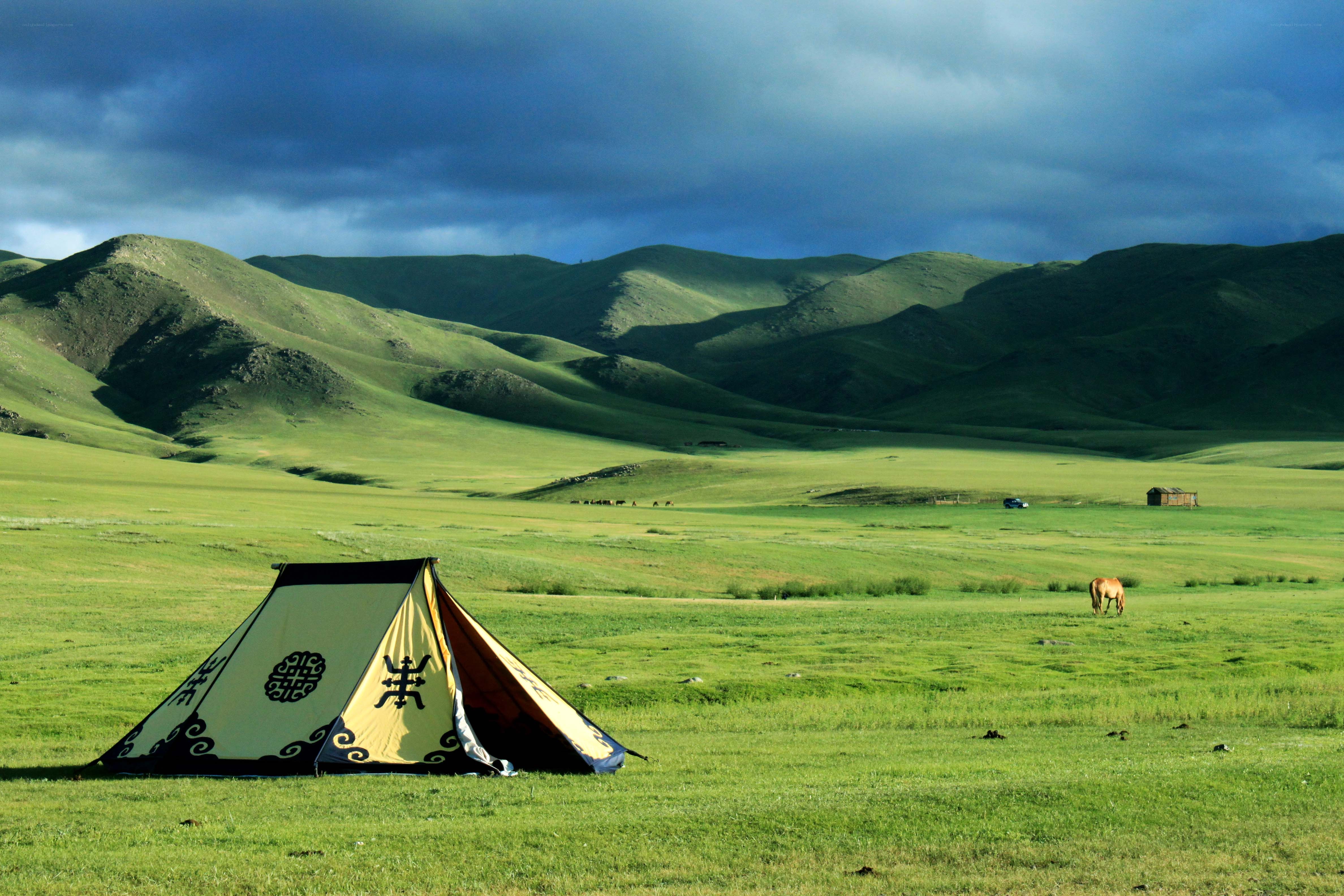 Tent in a green valley