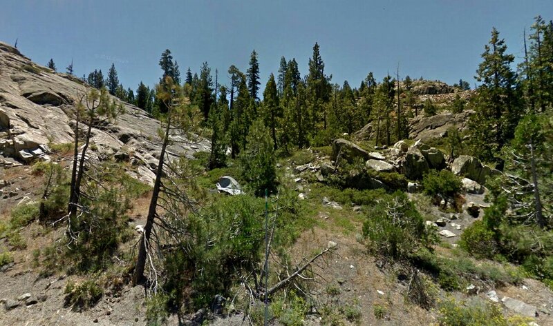 Tent in Forested Hillside