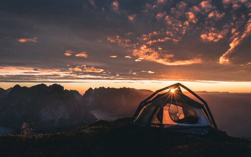 Tent on Mountain Peak — Orange