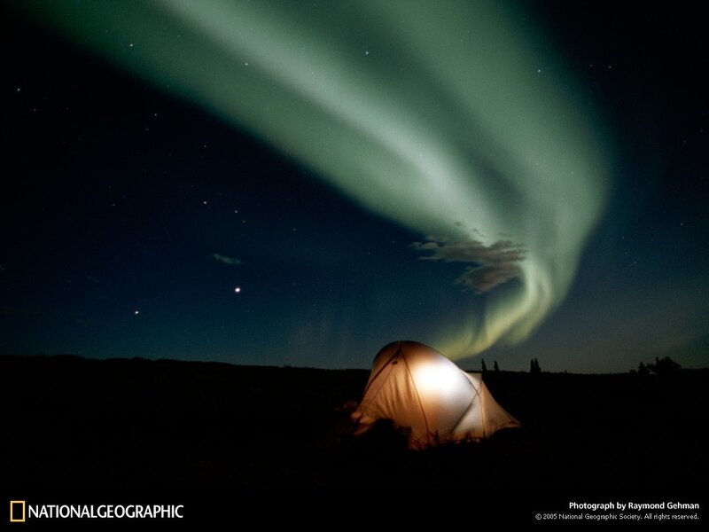 Tent under aurora borealis