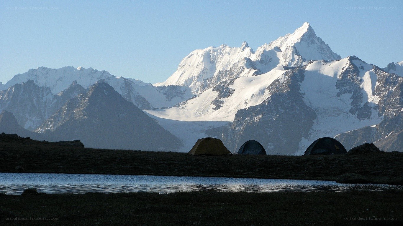 Tents at a mountain lake