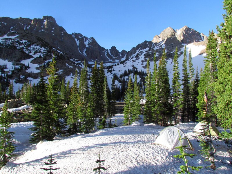 Tents in Snowy Forest