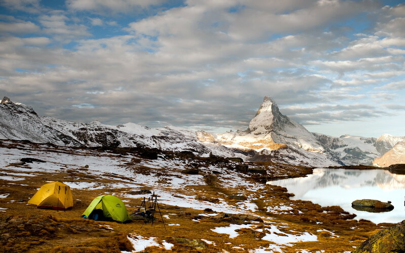 Tents Near Mountain Lake