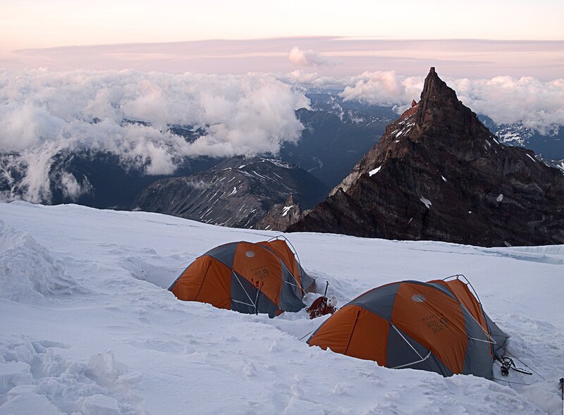 Tents on a snowy mountain peak