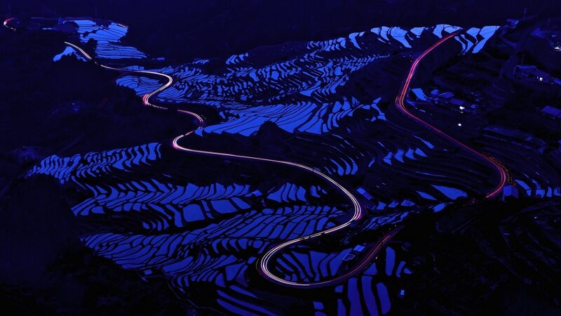 Terraced fields at night