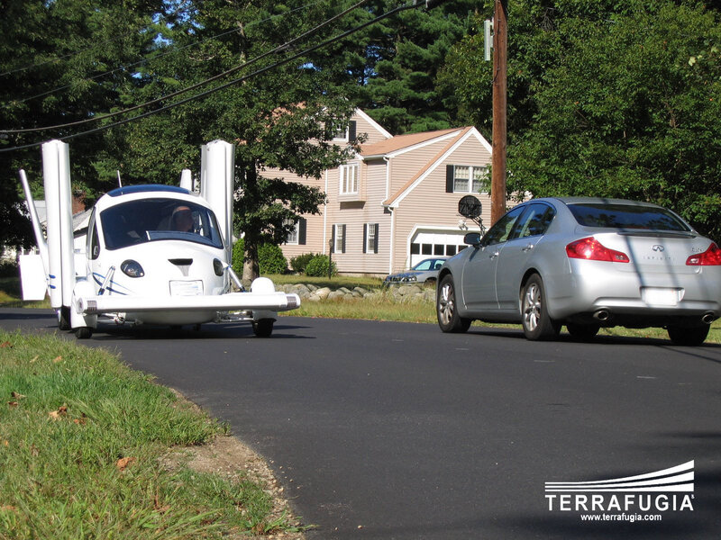 TerraFugia flying car on a street